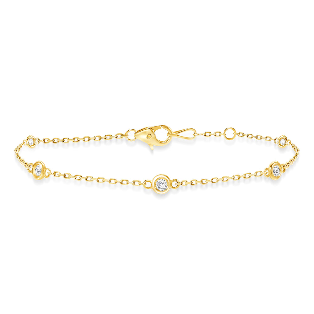 yellow gold diamond bezel train bracelet