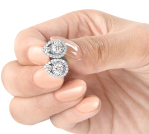 Diamond Tear Drop earrings in hand 