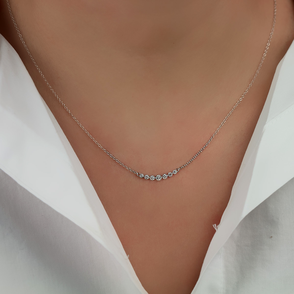 White Gold Seven Stone Diamond Necklace on woman 