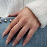 14k white tilted baguette diamond ring